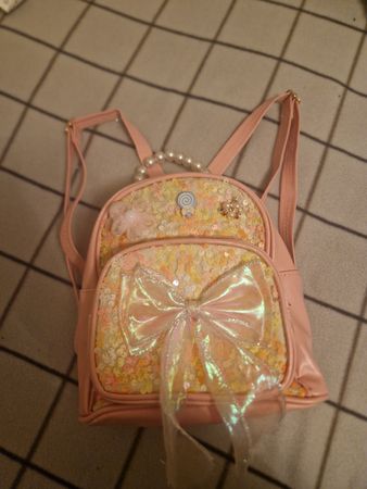 Neuwertiger Mädchen Rucksack mit Pailletten und Schleife!