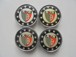 4 caches pour jantes Platin, bon état. Diamère : 75 mm.