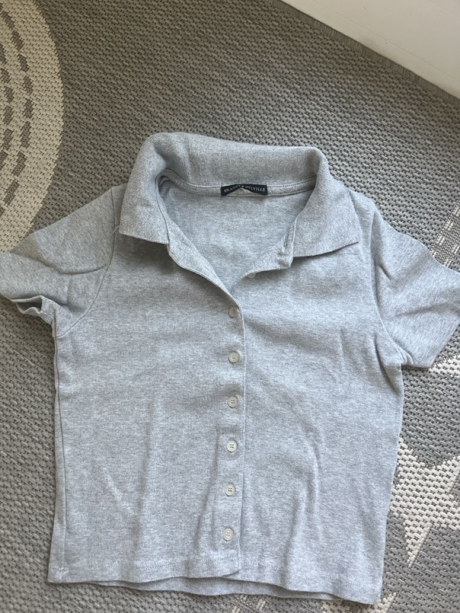 Magliette Polo: Polohemd Grau Grösse One Size Brandy Melville – Usato da Gysenstein venduto da happy_life_