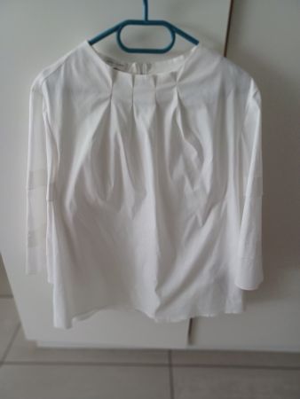 Chemisier blanc élégant, parfait pour le printemps!