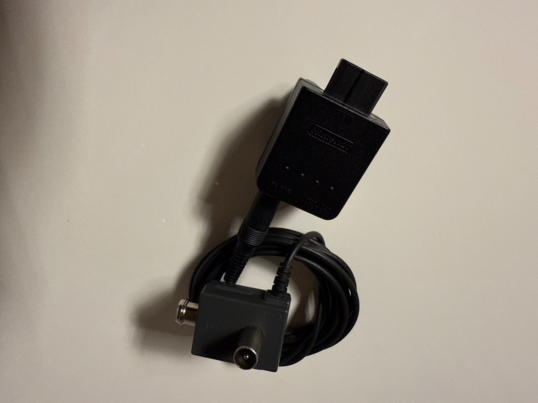Nintendo Konsolen: Nintendo 64 RF Switch/Modulator – Gebraucht aus Niederbipp von nbf_qy2d
