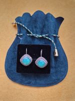 Jolies boucles d'oreilles vintage avec pierres véritables.