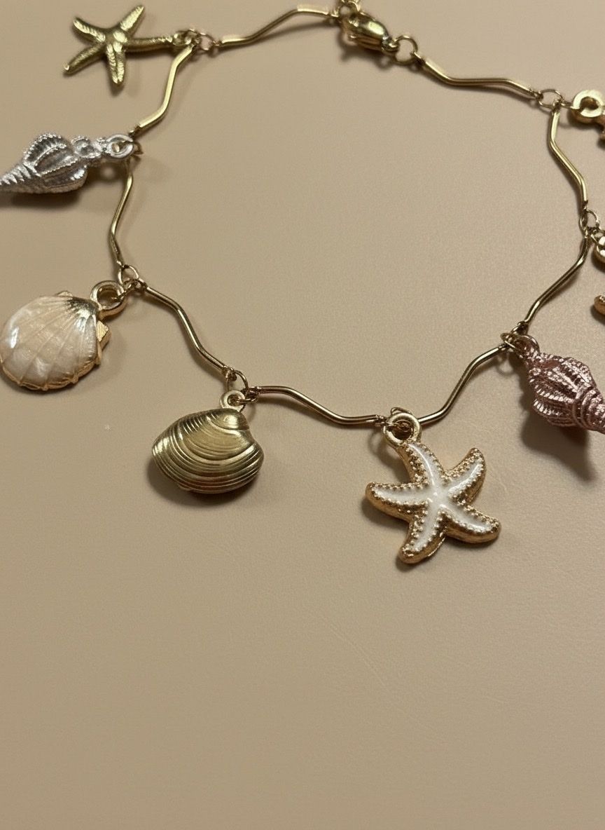 Bracciali & Braccialetti: Summer Ready: Seashell & Starfish Charm Bracelet, New – Nuovo e nell'imballaggio originale da Saland venduto da ele_vc96 1