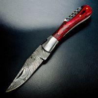 Couteau pliant lame acier Damas et manche bois d'olivier