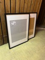 Lot de 2 cadres IKEA RIBBA noirs, format 50x70 cm.