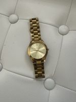 Montre MK bon état 