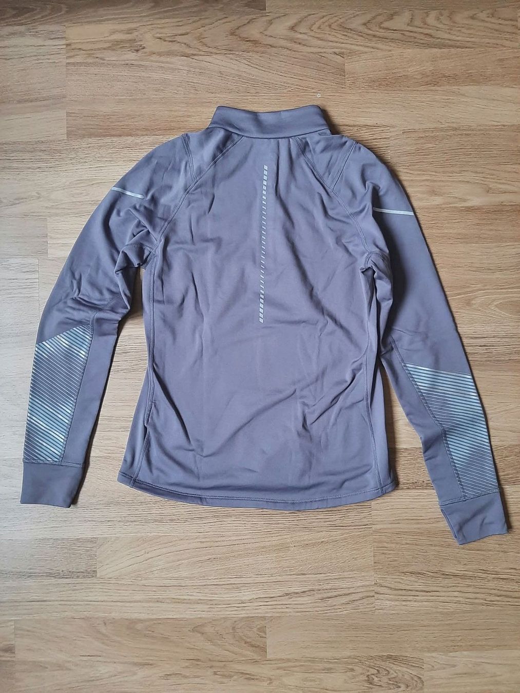 Asics Tops: Pull thermique Asics – D'occasion à Neuchâtel par col_6rbm 1