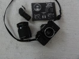 Canon A-1 Spiegelreflex analog mit Objektiv und Angelfinder
