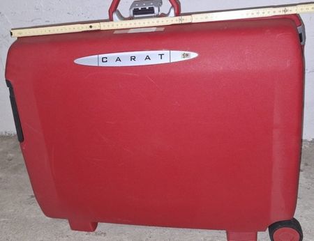 Valise rouge CARAT roulante occasion  comme  neuve