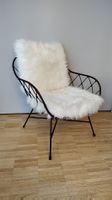Fauteuil métal noir et fausse fourrure blanc