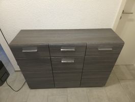 Modernes Sideboard in Dunkelgrau mit Holzmaserung