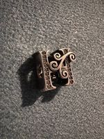 Pandora Buchstabe H