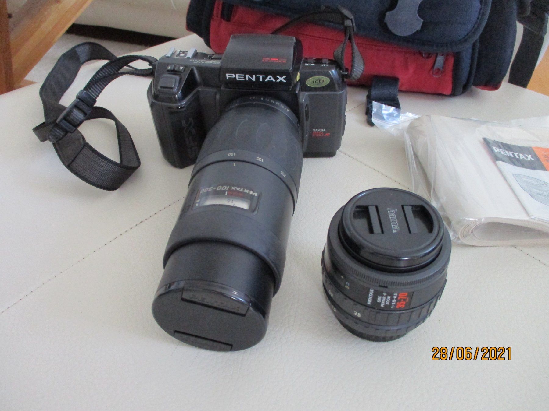 Pentax Fotocamera: Pentax SFxN Analog Kamera mit Zubehör – Usato da Liestal venduto da Disc-Point 1