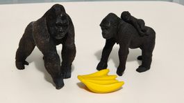 Schleich Gorillafamilie – 2 Gorillas + Jungtier + Bananen