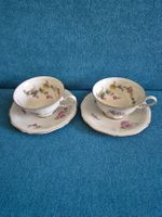 2 Mocca Tassen mit gleichem Blumen Dekor