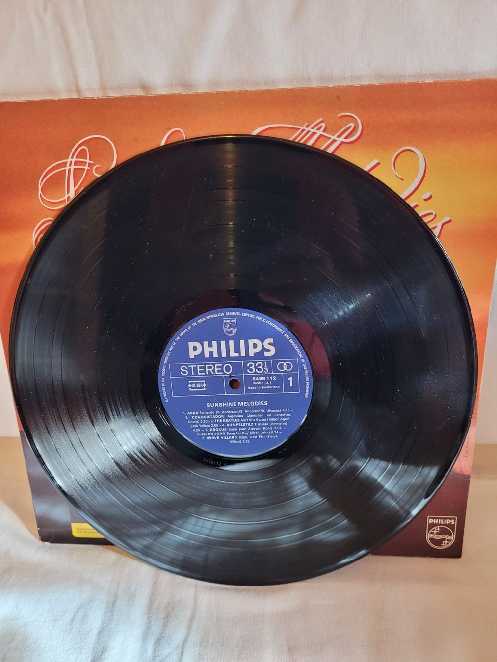 Schallplatten: Vinyle "Sunshine Melodies" - ABBA, Beatles... – Gebraucht aus la Chaux-de-Fonds von Lampe 3