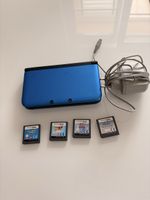 Nintendo 3ds xl + chargeur + 4 jeux