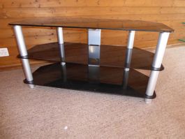 TV Möbel, 3 dunkle Glasflächen, silberne Füsse