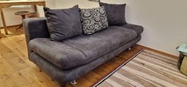 Gemütliches graues Sofa mit Schlaffunktion zu verkaufen!