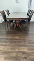 Esstisch mit 4 Stühlen Holz dunkel mit schwarzen Sitzflae...
