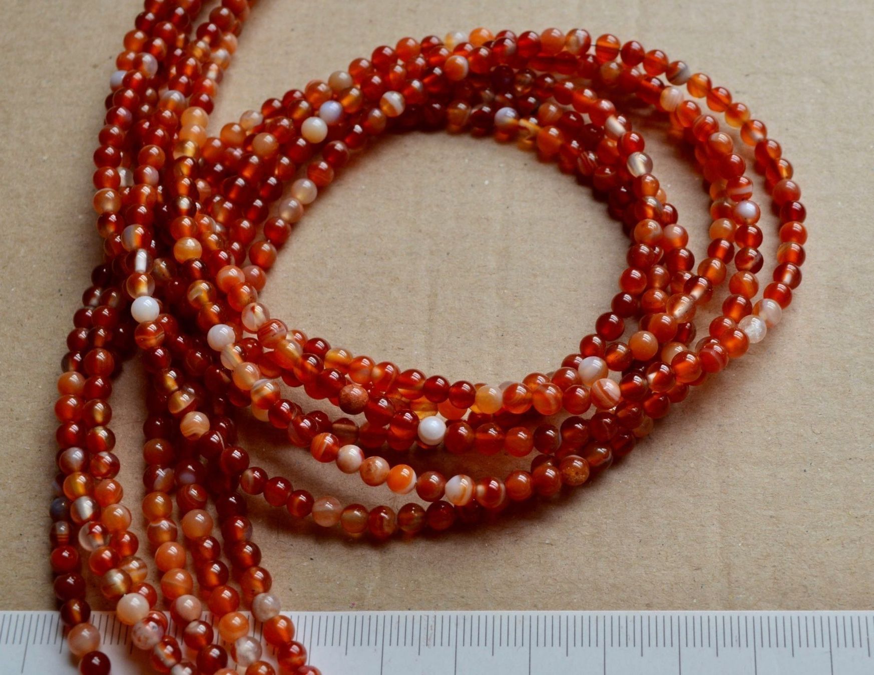 Catenine: Achat  Karneol Farbe  feiner Strang EXTRA – Nuovo e nell'imballaggio originale da Leuggern venduto da gemshow 2