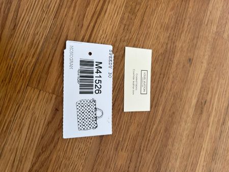 Etiketten "Louis Vuitton" - Speedy Tasche