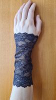 Armstulpen aus Spitzen