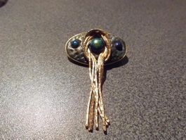 Brosche schwarz, blaue Steine, goldfarbi
