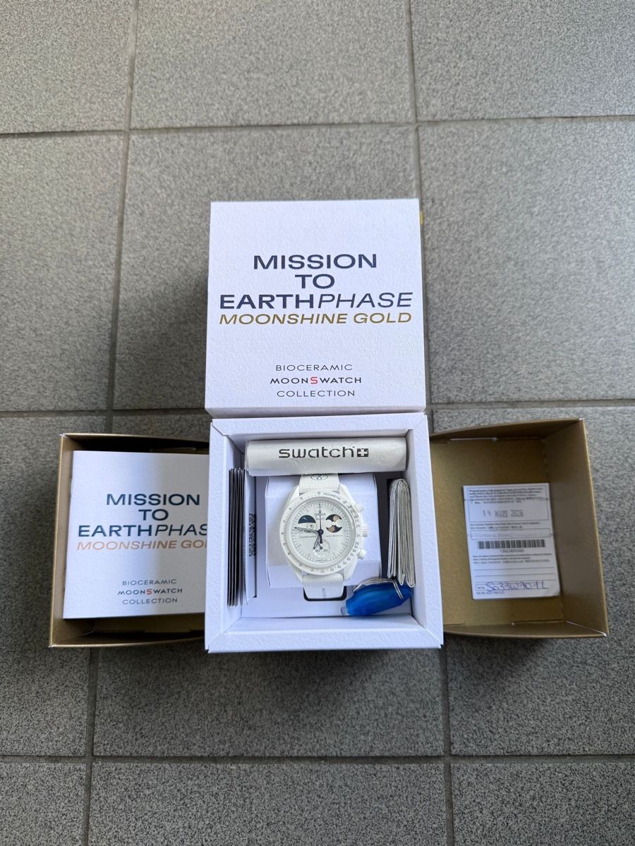 Swatch Montres: Swatch omega Moonshine Gold  – Neuf avec emballage d'origine à Sierre par isa_zty2