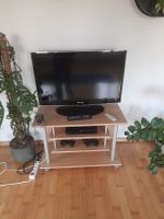 TV-Möbel mit Rollen helle Holzoptik guter Zustand