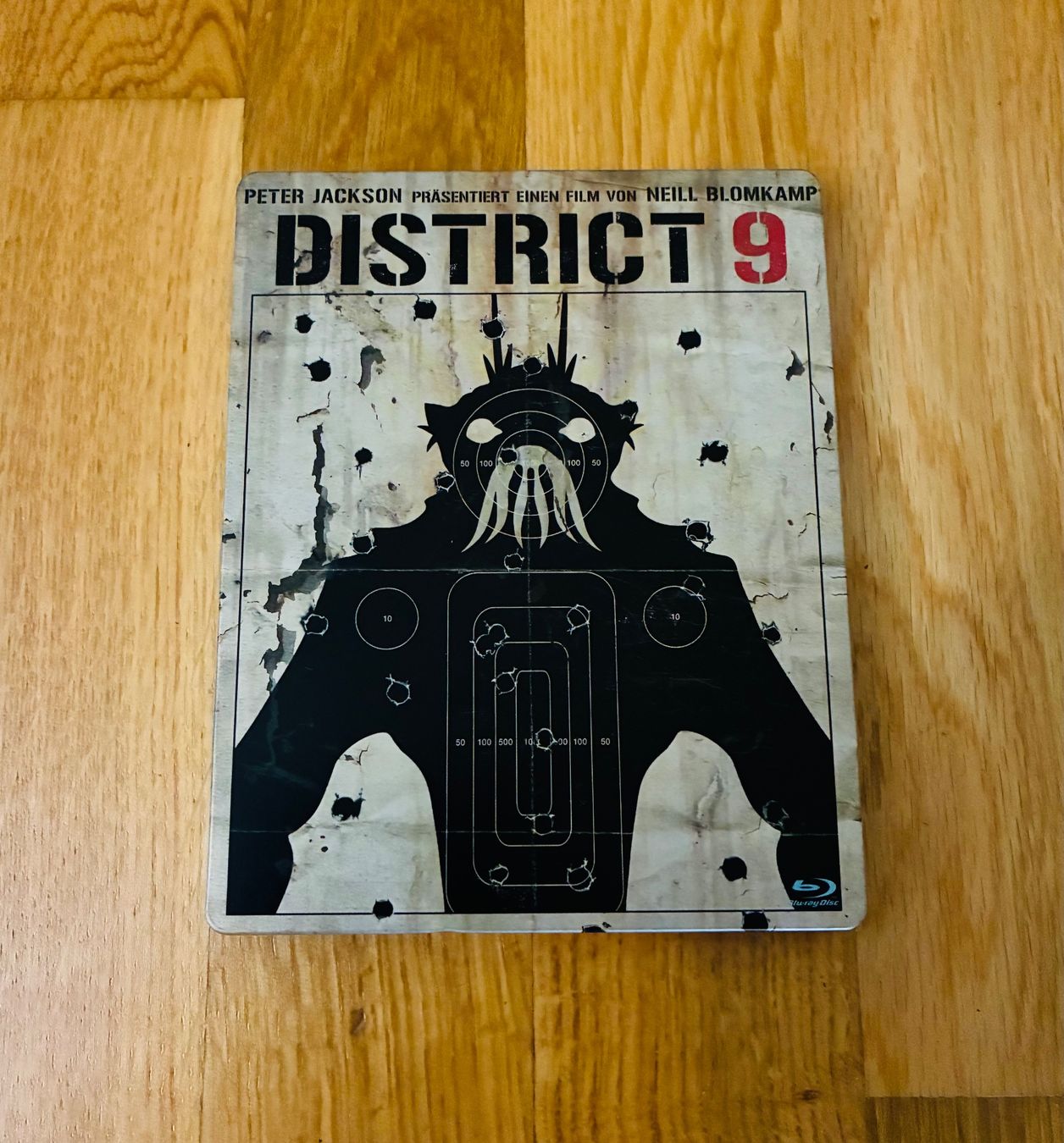 Alle DVDs: District 9 / Bluray Steelbook – Gebraucht aus Bern von RageMM87