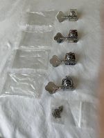 Mécaniques chromées x 4  pour basse de droitier neuves 