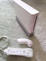 Console Nintendo Wii blanche + jeux + manettes + wii board