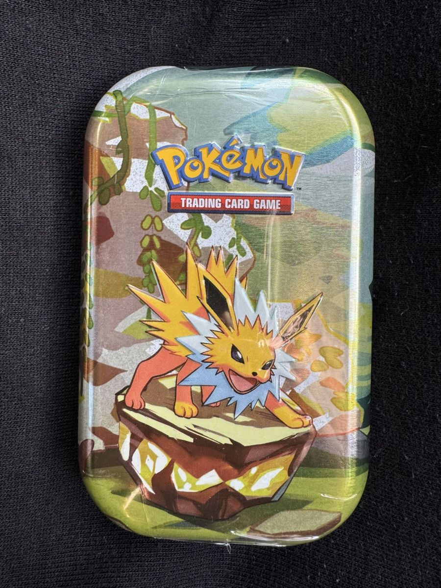 Pokémon Cartes à collectionner: Pokemon Prismatic Evolution Mini Tin - Jolteon - Sealed - EN – Neuf avec emballage d'origine à Bellinzona par TheCarden