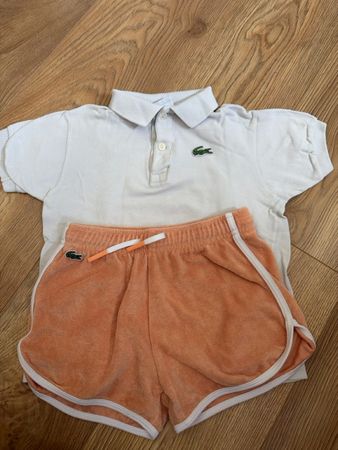 Ensemble polo et short Lacoste orange et blanc taille 128