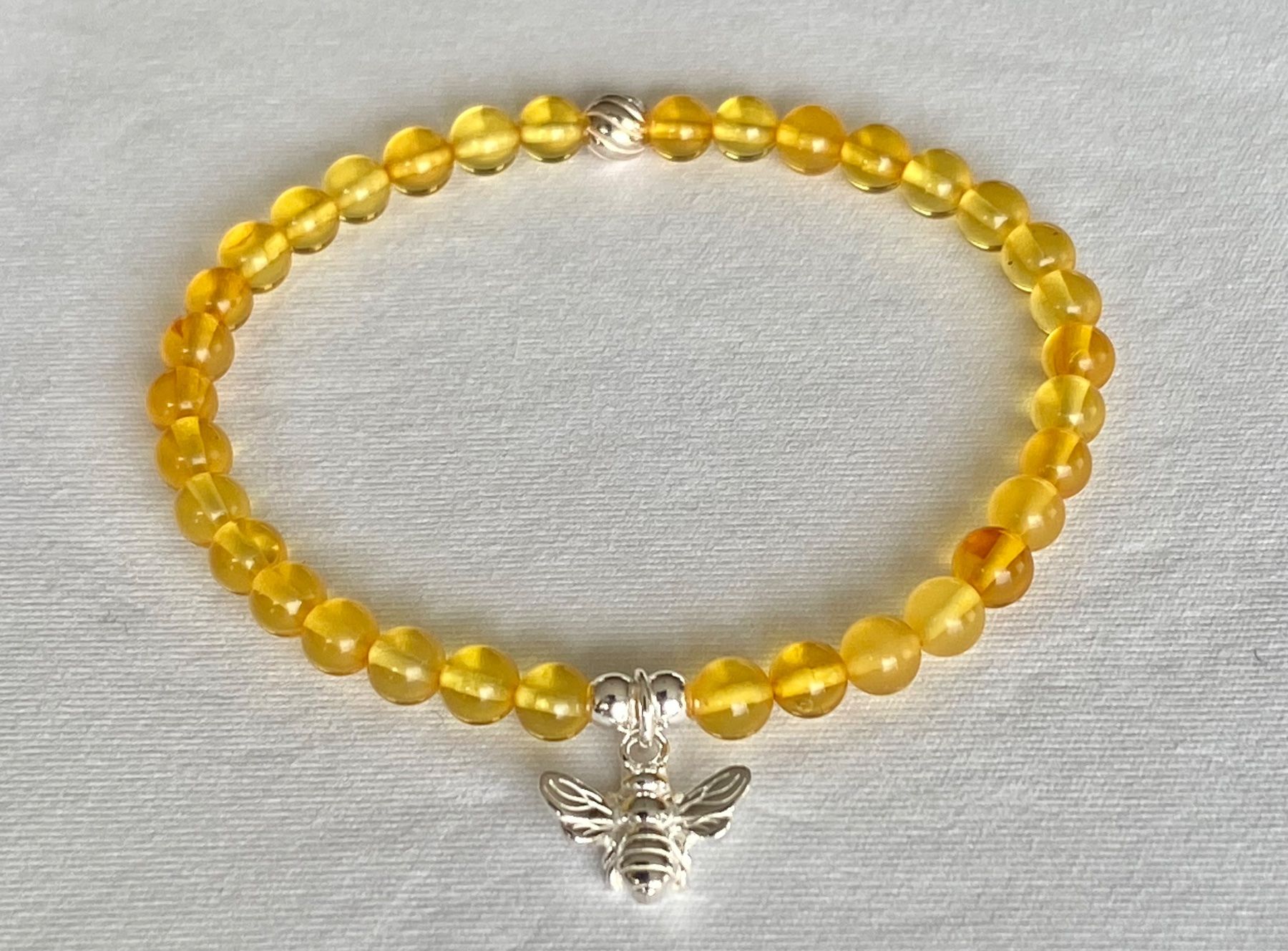 Armbänder & -reifen: Edelstein Armband Honig Bernstein mit Silber auf Mass – Neu und originalverpackt aus Zuzwil SG von Lemliskat