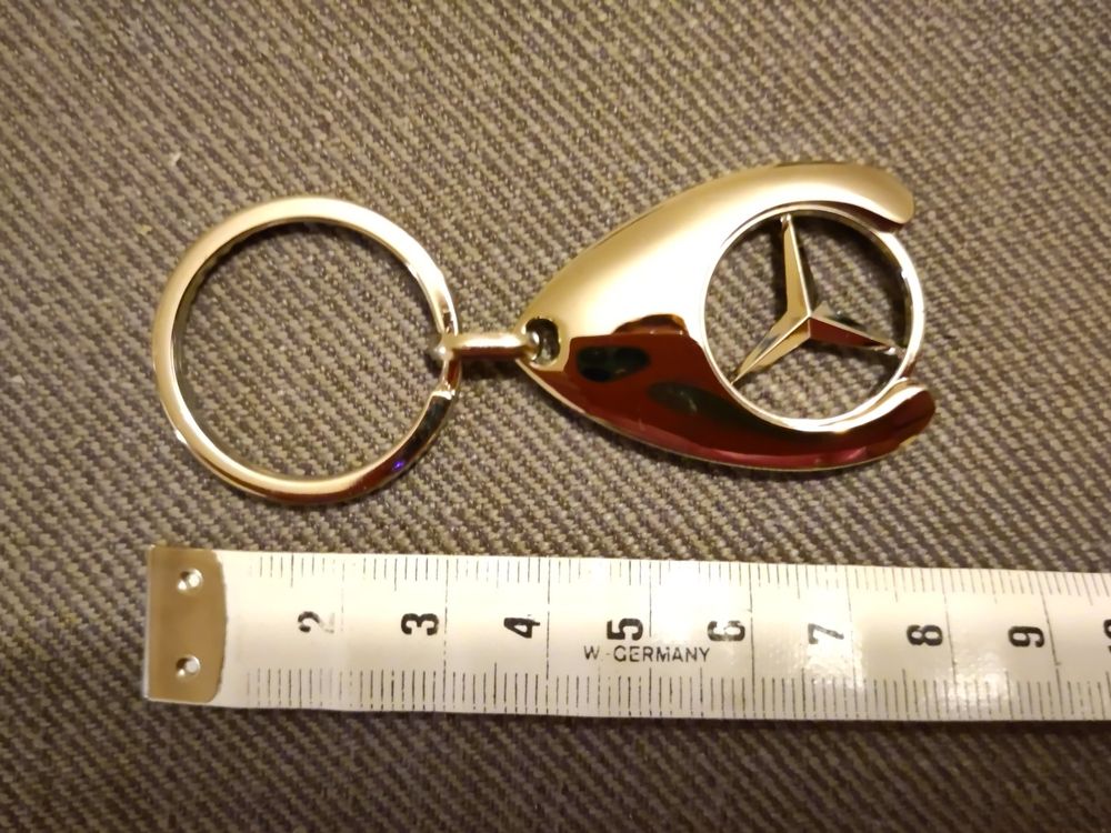 Mercedes-Benz Schlüsselanhänger mit Einkaufschip, gold