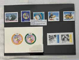SCHWEIZER BRIEFMARKEN-SAMMLUNG „Helvetia“/Comite Olympique“