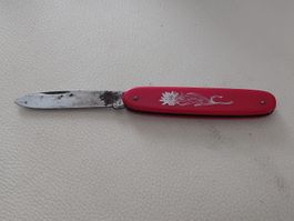 Taschenmesser rot mit Edelweiss Motiv gebrauchter Zustand