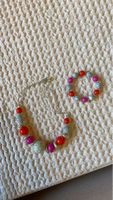 Collier fantaisie perles rondes et ovales argentées