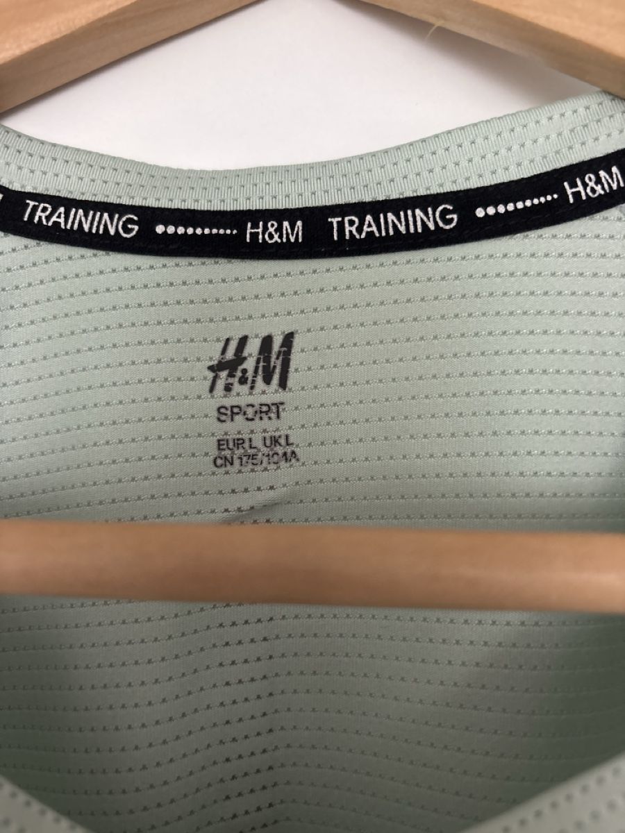 H&M T-shirt: H&M Sport T-Shirt hellgrün  – Usato da Meilen venduto da treck0z 1