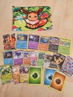 Pokemonkarten und Evoli Täschli