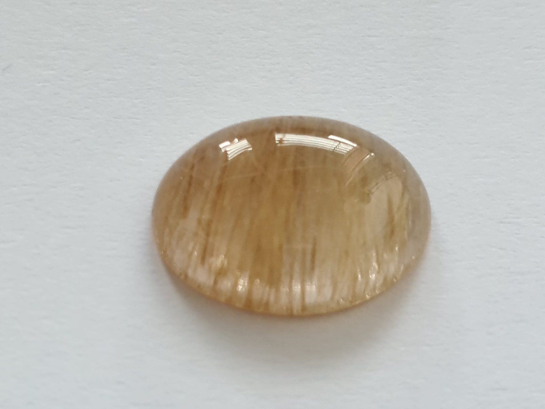 Pietre preziose: Rutilquarz; 7.26ct; oval Cabochon – Nuovo (secondo la descrizione) da Horgen venduto da Agopton