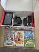 Console Nintendo Switch noir occasion en bon état avec 3JEUX
