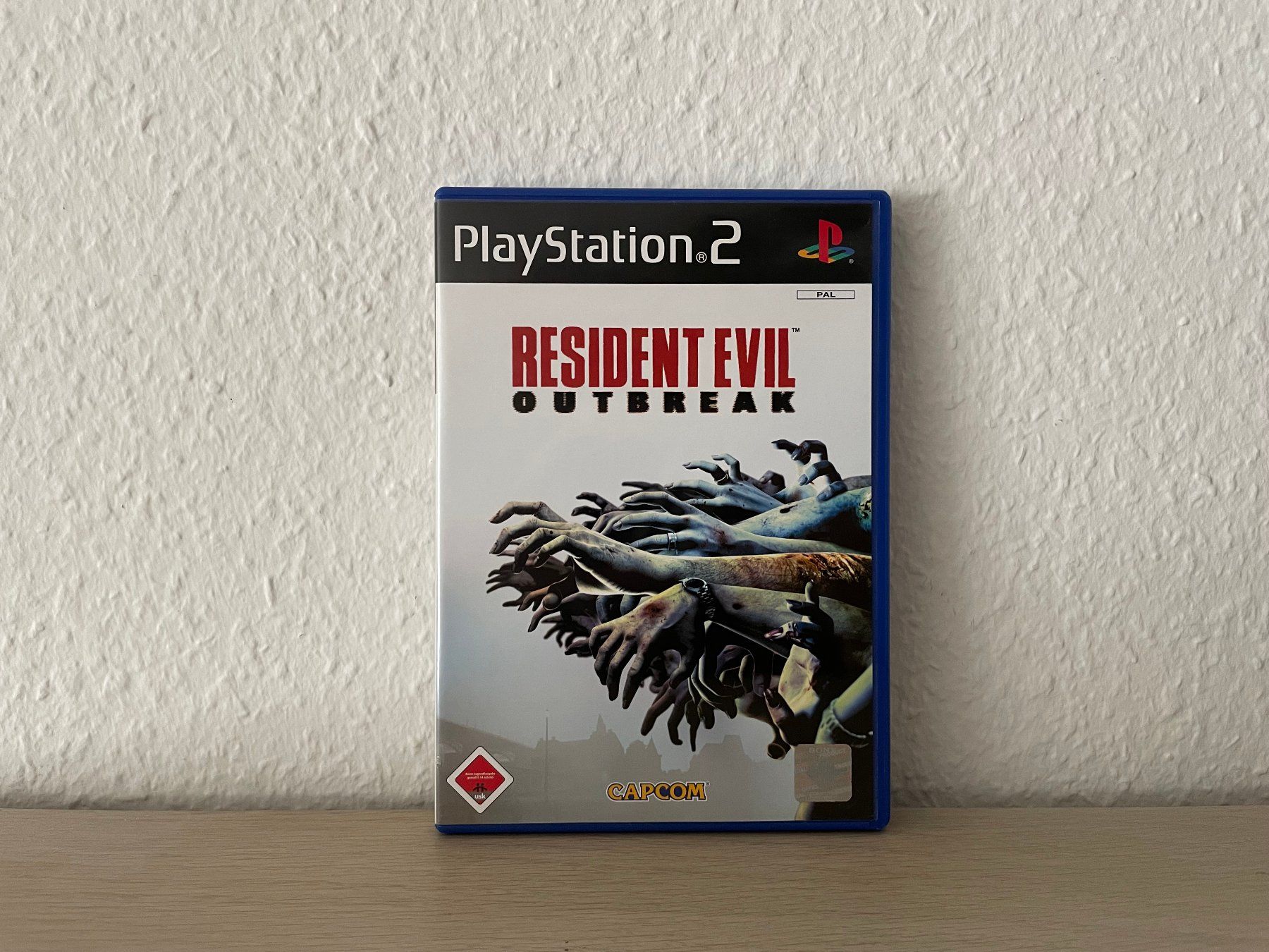 Capcom Spiele: Resident Evil Outbreak / PS2 – Gebraucht aus Allschwil von SliceSlice
