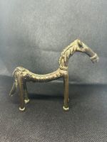 Statue cheval dos courbé