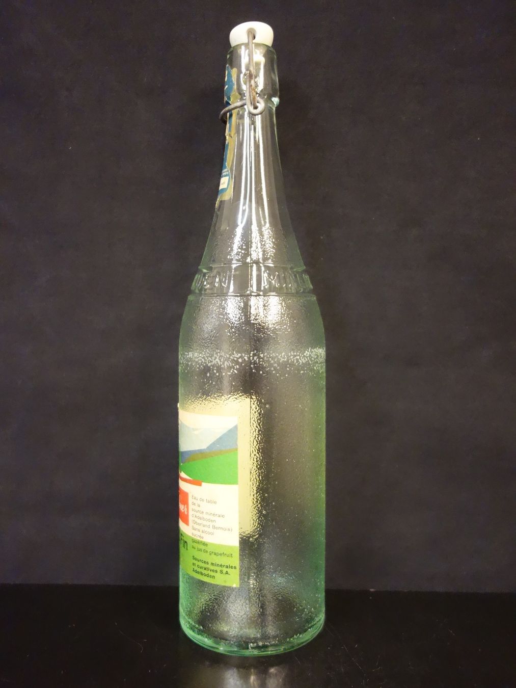 Bicchieri, Caraffe & Bottiglie: alte Flasche ADELBODNER GRAPEFRUIT FIN 1965 – Usato da Kerzers venduto da Flaschenposten 1