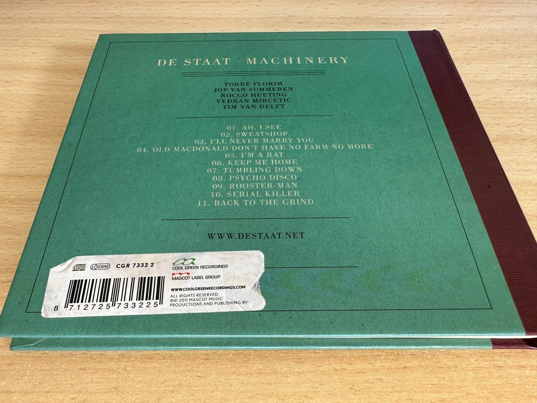 CD: De Staat – Machinery – Usato da Rikon im Tösstal venduto da Alpenmutz 1