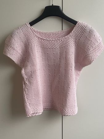 Crop top en maille rose pâle, parfait pour l'été!