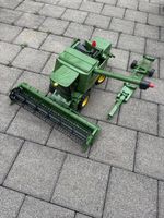 John Deer Spielzeug-Mähdrescher
